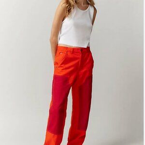 BDG Urban Outfitters red and orange colorblock cotton carpenter pants.